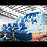 Toboggan gonflable aquatique 4 personnes Surf and slide de 9.50 x 6.50 x 7.20 mètres